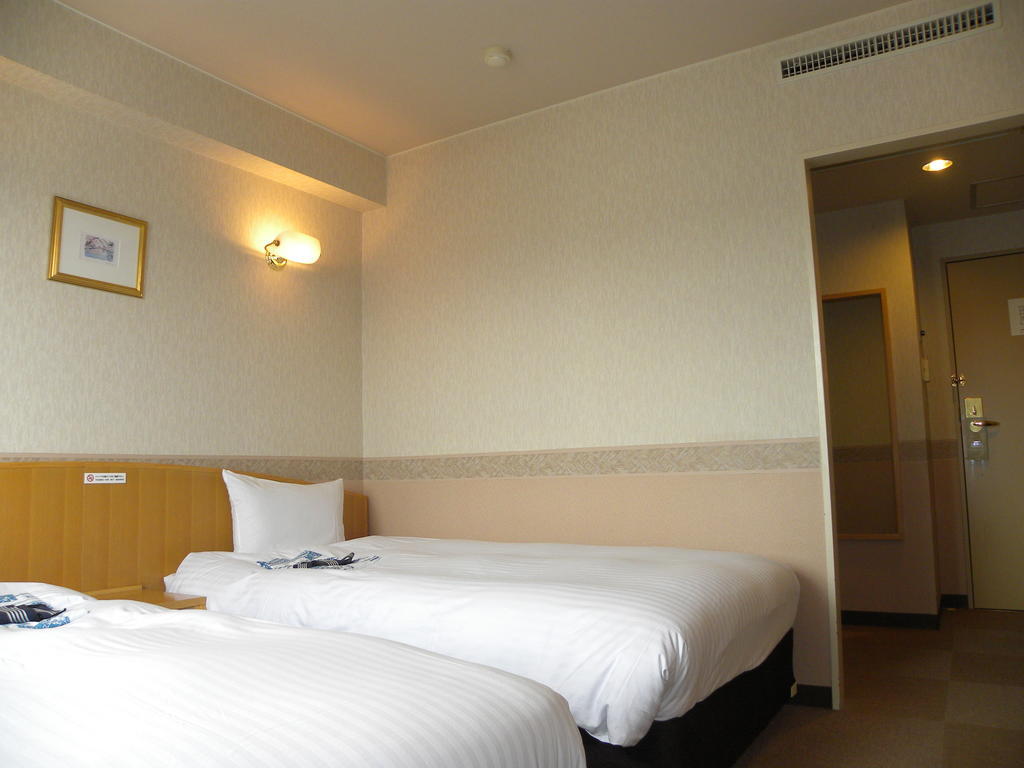 Hotel Benex Jonezava Szoba fotó