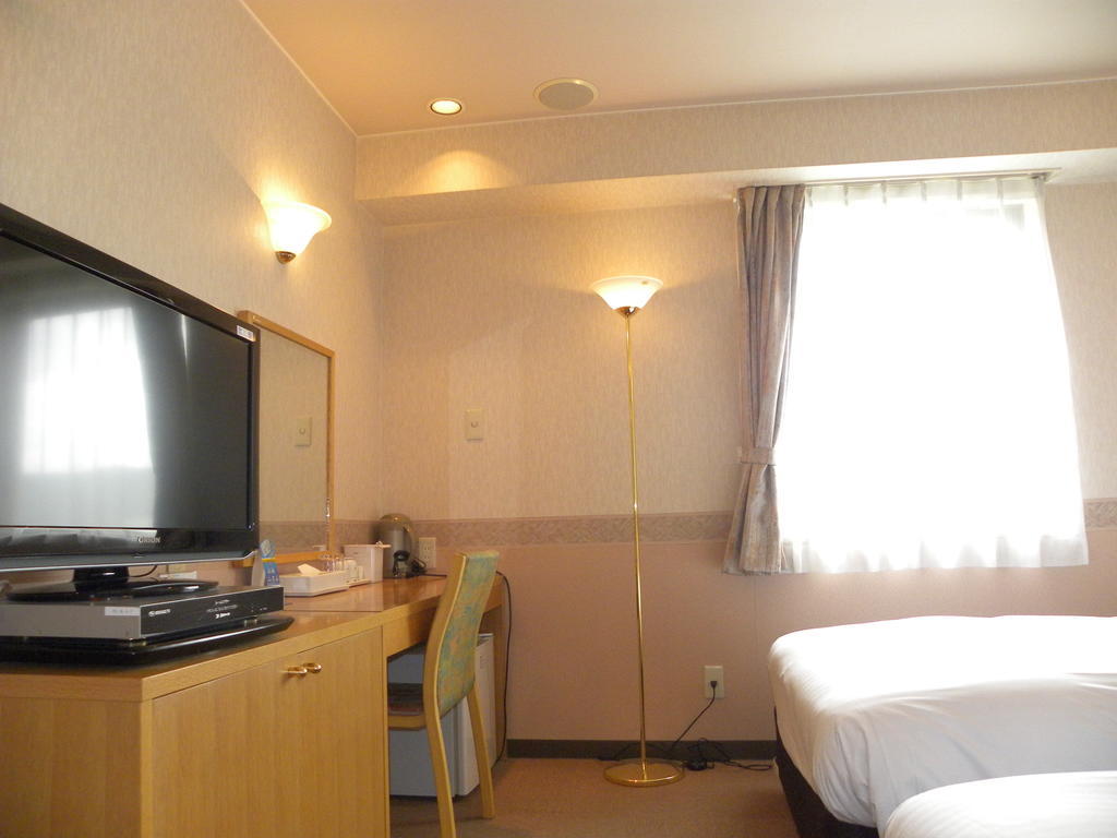 Hotel Benex Jonezava Szoba fotó