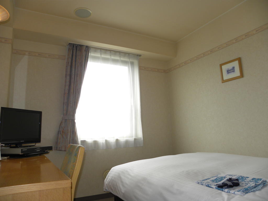 Hotel Benex Jonezava Szoba fotó
