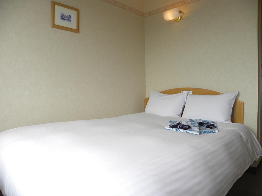 Hotel Benex Jonezava Szoba fotó